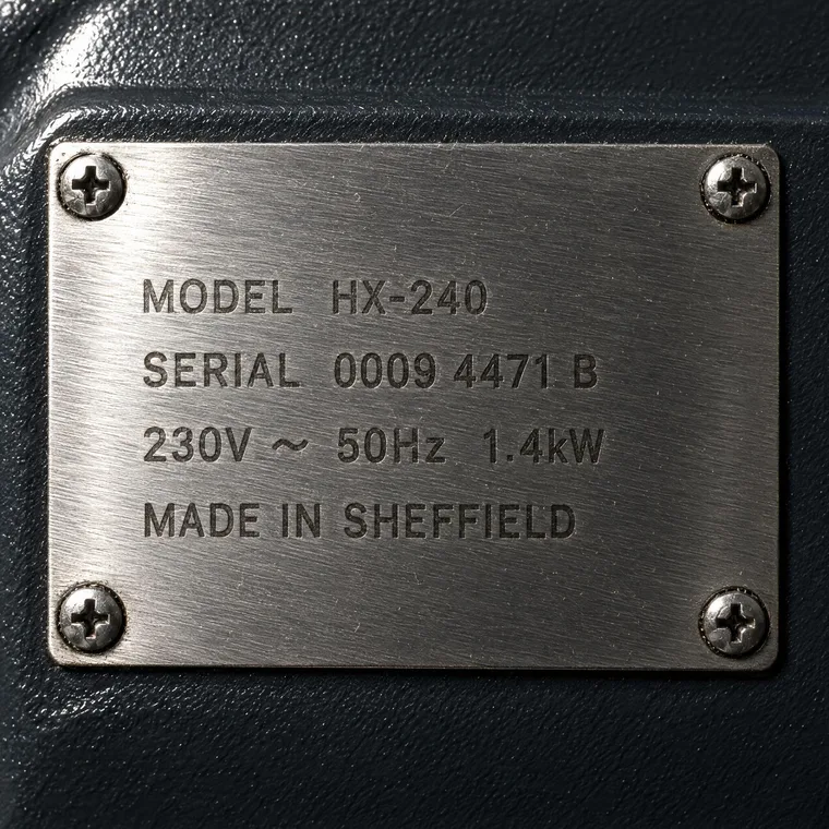 An equipment plate: laser etching on brushed steel — gpt-image-2.5-flare