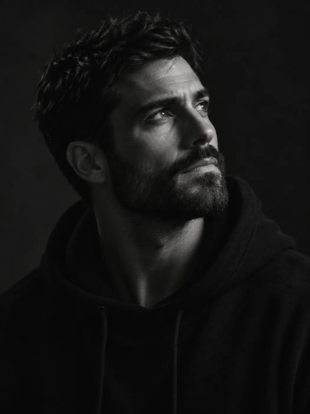Cinematic black-and-white studio portrait